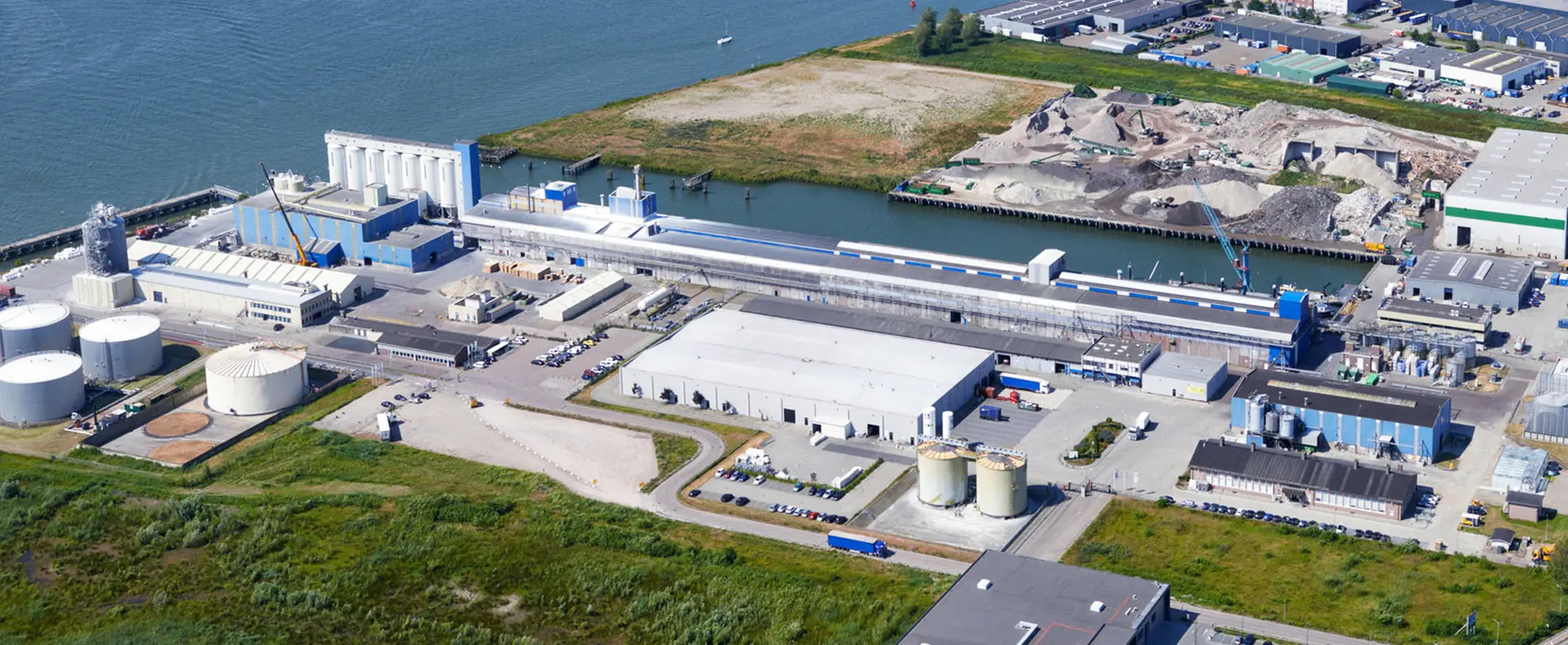 Industrial fertilizer facility A large industrial fertilizer production facility with waterway access