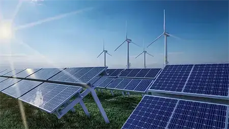 Solar panels and wind turbines generating renewable energy.