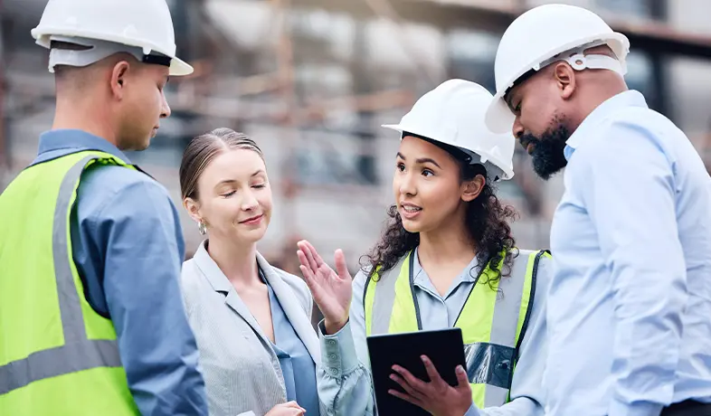 Professionals with diverse roles in turnaround planning are discussing