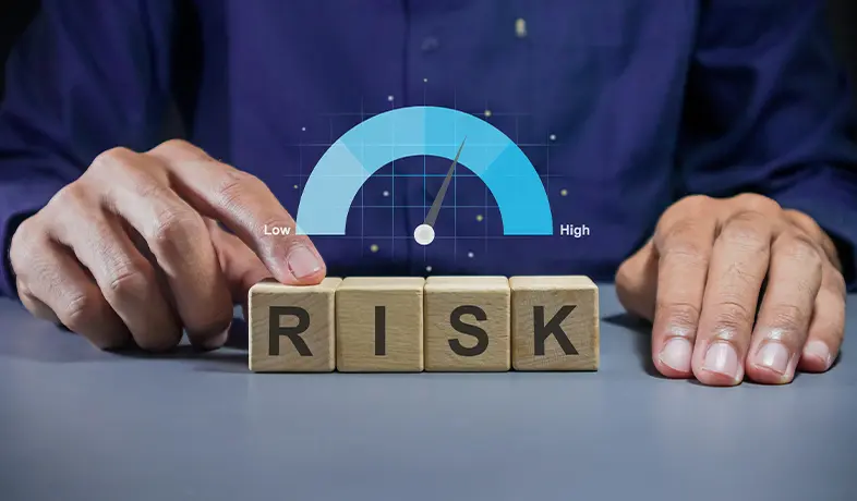A professional assessing project risks with a meter indicating medium level